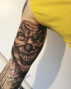 View Horror Clown on inner bicep by Tom Wood